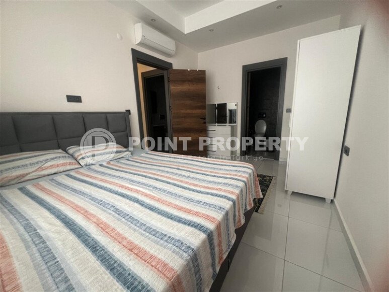 Apartment 2+1 on a high floor in a hotel-type complex in Mahmutlar-id-9740-photo-7