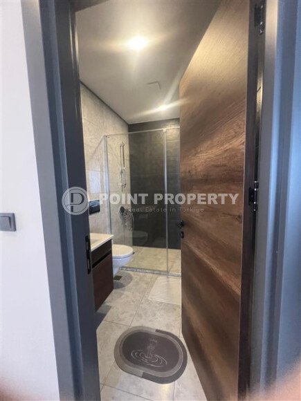 Квартира 2+1 на высоком этаже в комплексе отельного типа в Махмутларе-id-9740-фото-9