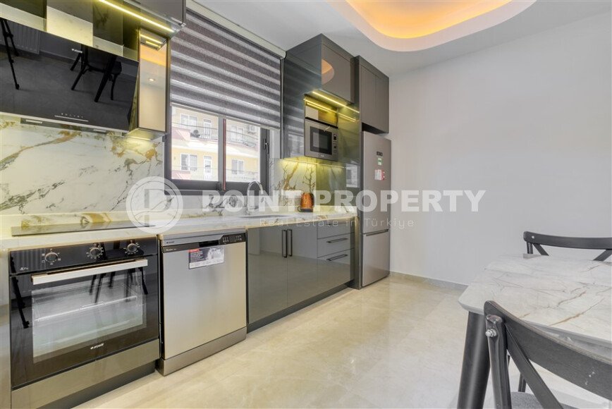 Family apartment 125 m² in the center of Alanya with separate kitchen and hotel infrastructure-id-9743-photo-4