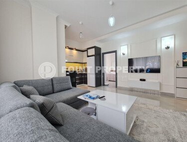 Apartment 55 m² with two balconies in the center of Mahmutlar-id-9746-photo-3