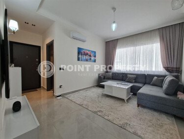 Apartment 55 m² with two balconies in the center of Mahmutlar-id-9746-photo-4