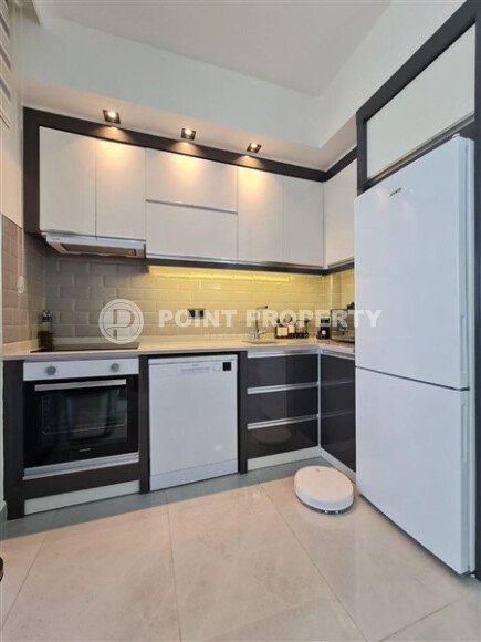 Apartment 55 m² with two balconies in the center of Mahmutlar-id-9746-photo-5