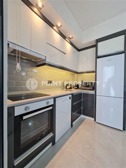Apartment 55 m² with two balconies in the center of Mahmutlar-id-9746-photo-6