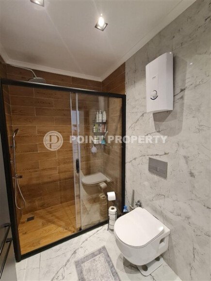 Apartment 55 m² with two balconies in the center of Mahmutlar-id-9746-photo-12