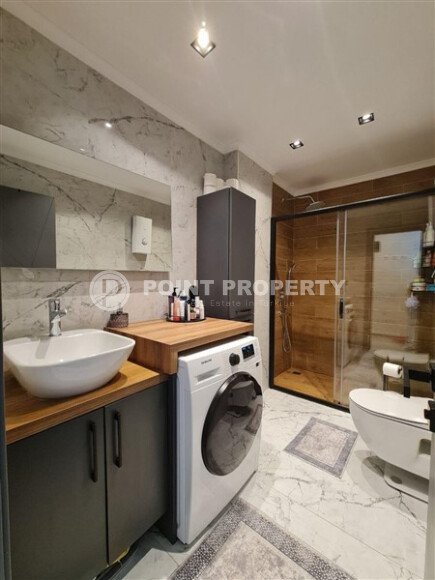 Apartment 55 m² with two balconies in the center of Mahmutlar-id-9746-photo-13