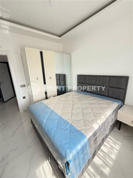 Светлая квартира 50 м² в новом комплексе в Каргыджаке-id-9748-фото-2