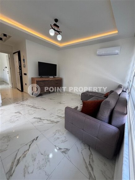 Cozy furnished apartment 55 m² in the area of Alanya Center with developed infrastructure-id-9749-photo-1