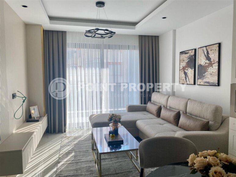Stylish 60 m² apartment in the center of Alanya with designer interior and luxurious furniture-id-9751-photo-1