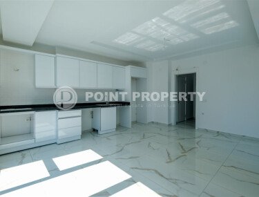 New 1+1 apartment with finished renovation in Mahmutlar area-id-9757-photo-2