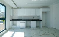 Новая квартира 1+1 с готовым ремонтом в районе Махмутлар-id-9757-фото-3