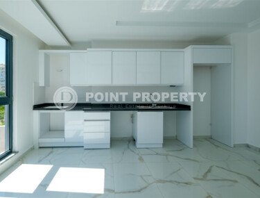 New 1+1 apartment with finished renovation in Mahmutlar area-id-9757-photo-3