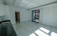 Новая квартира 1+1 с готовым ремонтом в районе Махмутлар-id-9757-фото-4