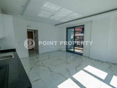 New 1+1 apartment with finished renovation in Mahmutlar area-id-9757-photo-4