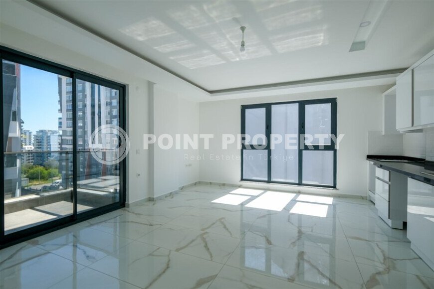 New 1+1 apartment with finished renovation in Mahmutlar area-id-9757-photo-5