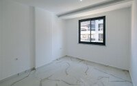 Новая квартира 1+1 с готовым ремонтом в районе Махмутлар-id-9757-фото-7