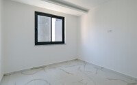 Новая квартира 1+1 с готовым ремонтом в районе Махмутлар-id-9757-фото-9