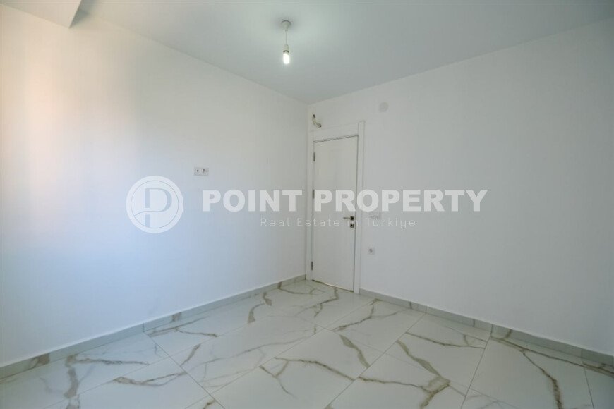 New 1+1 apartment with finished renovation in Mahmutlar area-id-9757-photo-10
