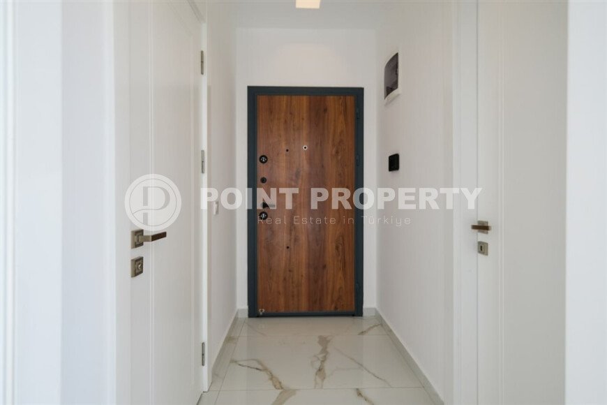 New 1+1 apartment with finished renovation in Mahmutlar area-id-9757-photo-11