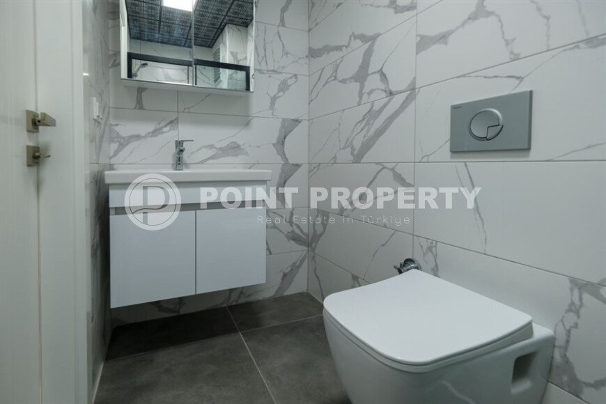 New 1+1 apartment with finished renovation in Mahmutlar area-id-9757-photo-12