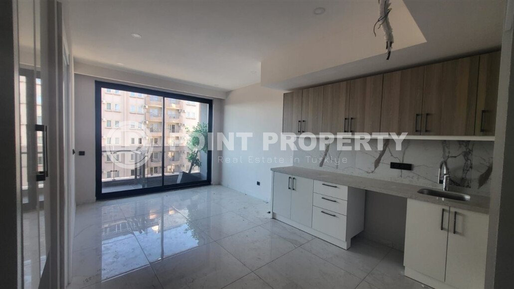 Комфортная квартира 57 м² с подогревом пола недалеко от пляжа Клеопатры, центр Аланьи-id-9766-фото-2