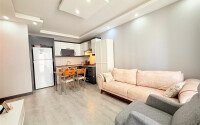 Комфортная квартира 50 м² в самом центре района Махмутлар-id-9779-фото-2