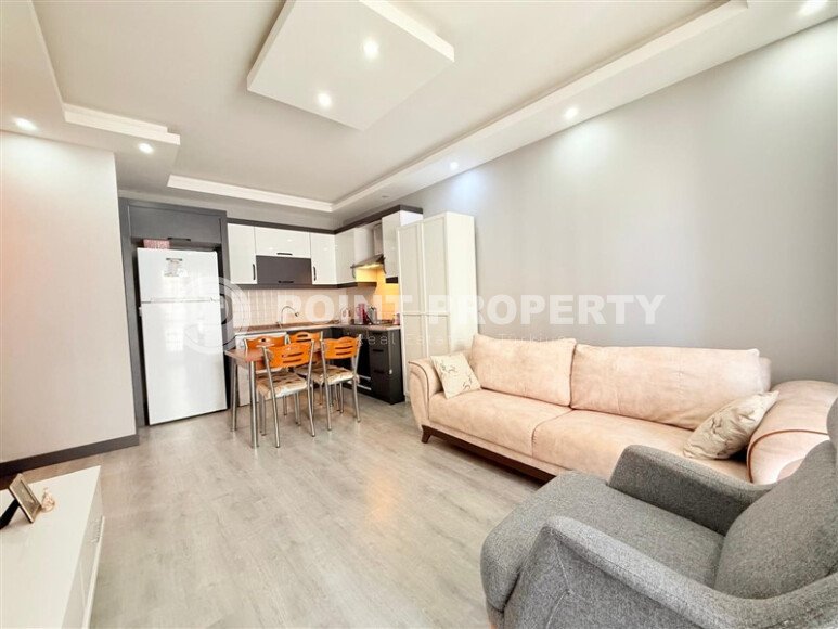 Комфортная квартира 50 м² в самом центре района Махмутлар-id-9779-фото-2