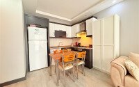Комфортная квартира 50 м² в самом центре района Махмутлар-id-9779-фото-3