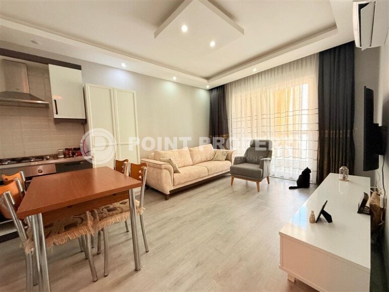 Комфортная квартира 50 м² в самом центре района Махмутлар-id-9779-фото-4