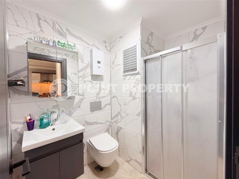 Комфортная квартира 50 м² в самом центре района Махмутлар-id-9779-фото-9