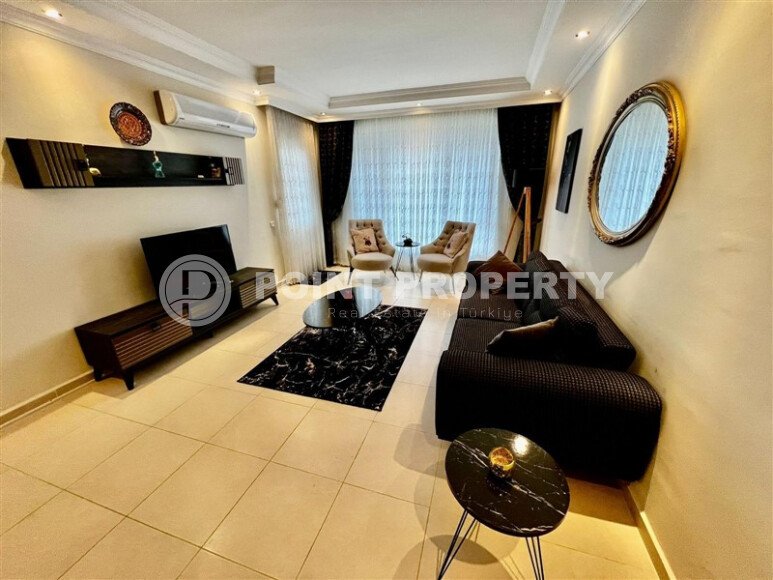 Spacious 2+1 apartment with furniture in a complex with developed infrastructure in the Mahmutlar area-id-9793-photo-2