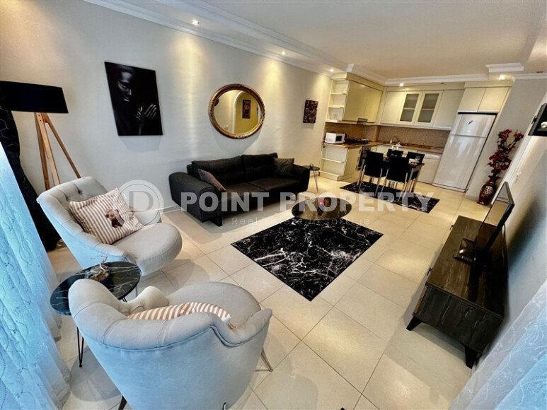 Spacious 2+1 apartment with furniture in a complex with developed infrastructure in the Mahmutlar area-id-9793-photo-4