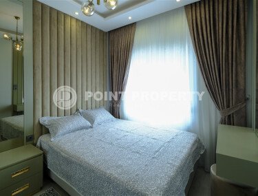 Современная светлая квартира 1+1 площадью 47 м² в жилом комплексе в Авсалларе-id-9808-фото-4