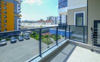 Современная светлая квартира 1+1 площадью 47 м² в жилом комплексе в Авсалларе-id-9808-фото-7