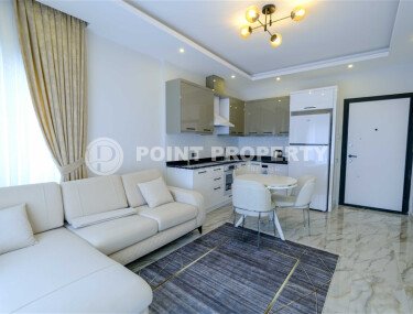 Современная светлая квартира 1+1 площадью 47 м² в жилом комплексе в Авсалларе-id-9808-фото-4