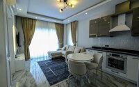 Современная светлая квартира 1+1 площадью 47 м² в жилом комплексе в Авсалларе-id-9808-фото-3