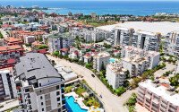 Современная светлая квартира 1+1 площадью 47 м² в жилом комплексе в Авсалларе-id-9808-фото-14