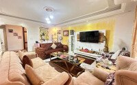 A bright furnished apartment with a functional layout and a balcony converted into a full-fledged living area.-id-9815-photo-1