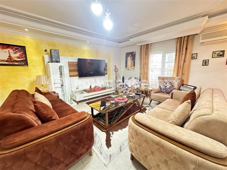 A bright furnished apartment with a functional layout and a balcony converted into a full-fledged living area.-id-9815-photo-2