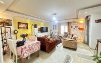 A bright furnished apartment with a functional layout and a balcony converted into a full-fledged living area.-id-9815-photo-3
