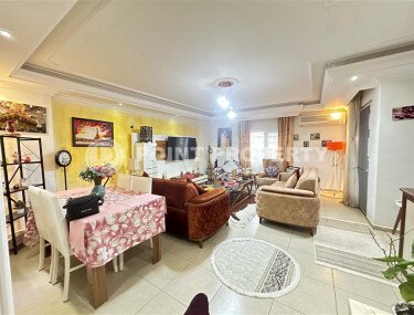 A bright furnished apartment with a functional layout and a balcony converted into a full-fledged living area.-id-9815-photo-3