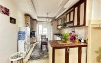 A bright furnished apartment with a functional layout and a balcony converted into a full-fledged living area.-id-9815-photo-5