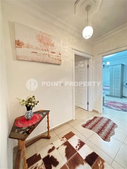 A bright furnished apartment with a functional layout and a balcony converted into a full-fledged living area.-id-9815-photo-7