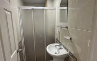 A bright furnished apartment with a functional layout and a balcony converted into a full-fledged living area.-id-9815-photo-15