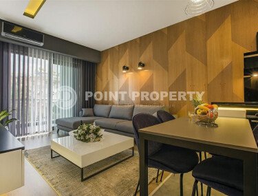 Квартира 1+1 с дизайнерским ремонтом в районе пляжа Клеопатры-id-9816-фото-2