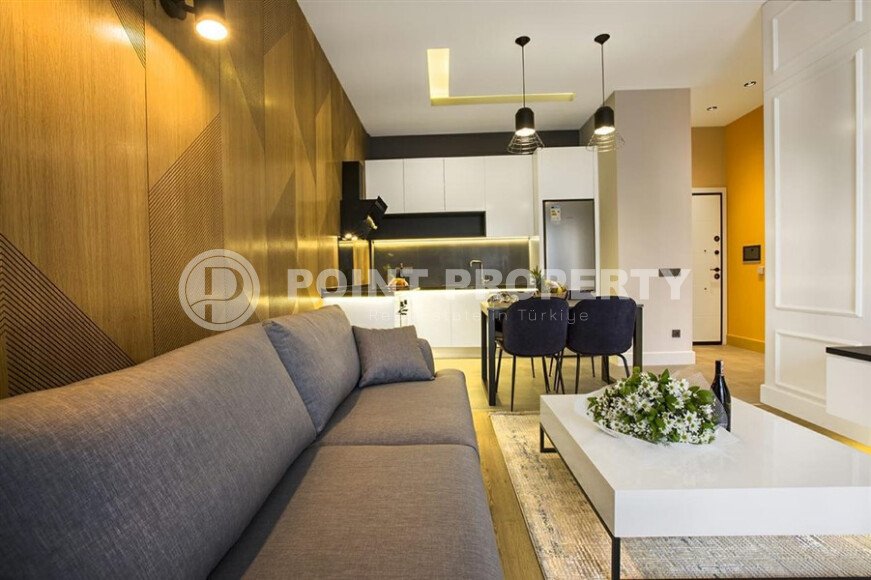 Квартира 1+1 с дизайнерским ремонтом в районе пляжа Клеопатры-id-9816-фото-3