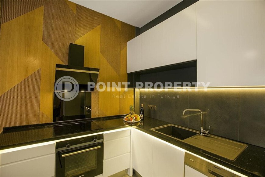 Квартира 1+1 с дизайнерским ремонтом в районе пляжа Клеопатры-id-9816-фото-6