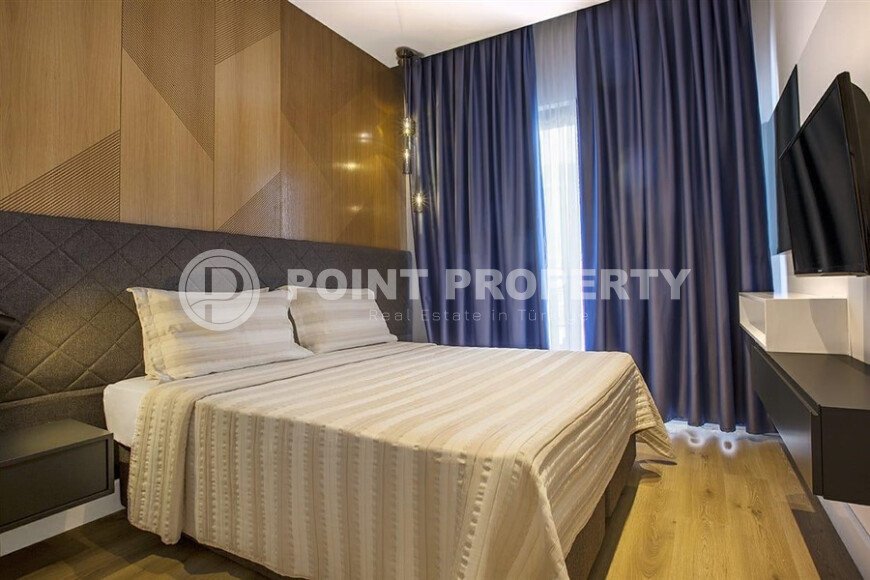 Квартира 1+1 с дизайнерским ремонтом в районе пляжа Клеопатры-id-9816-фото-9