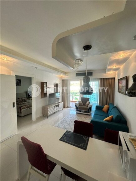 Современная 1-комнатная квартира 65 м² в комплексе, Махмутлар-id-9826-фото-2