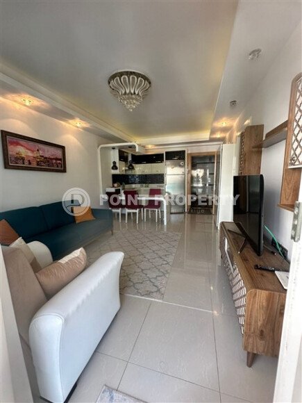 Современная 1-комнатная квартира 65 м² в комплексе, Махмутлар-id-9826-фото-4