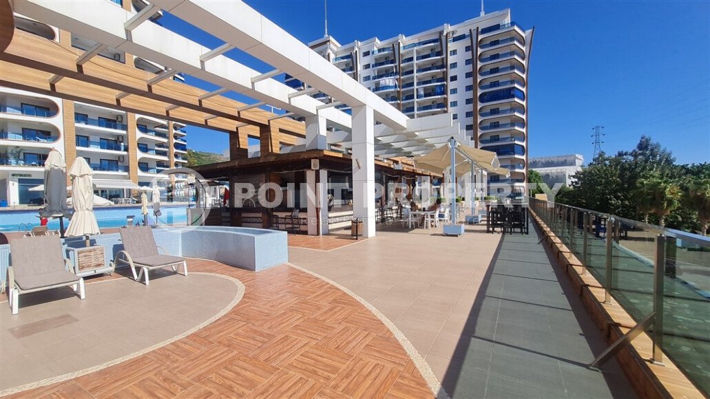 Современная 1-комнатная квартира 65 м² в комплексе, Махмутлар-id-9826-фото-11